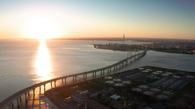 High-speed toll road, highway bypassing the city center St. Petersburg, the central section of the western high-speed section. A beautiful view of the sunset over the Gulf of Finland.