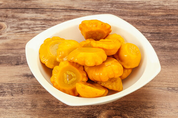Marinated yellow patisson in the bowl