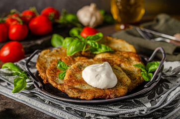 Potato pancakes with garlic and herbs