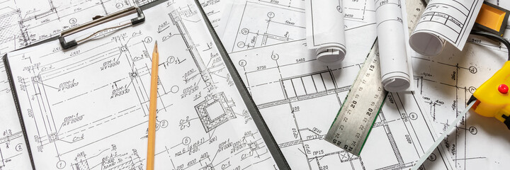 architect design working drawing sketch plans blueprints and making architectural construction...