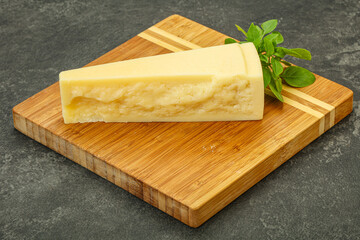 Hard parmesan cheese served basil