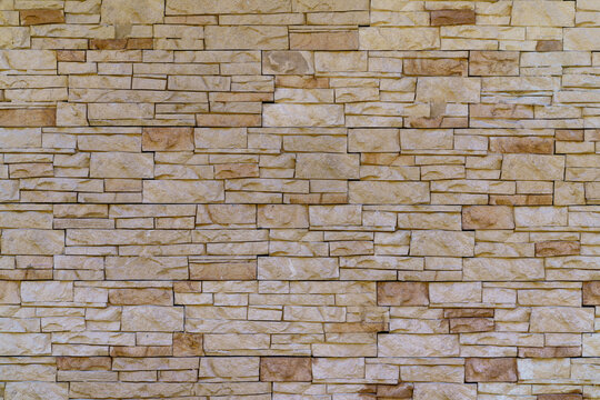 Background of brick stone wall texture. Close up image.