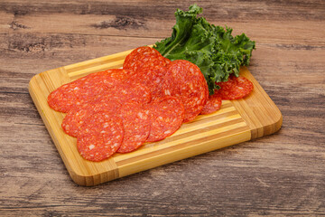 Italian spycy pepperoni sausage slices