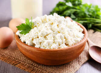 Cottage cheese in a plate on the table, serving cottage cheese. Food photo