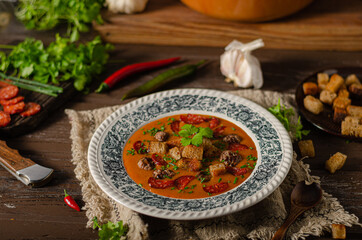 Goulash soup with beef and spicy sausage