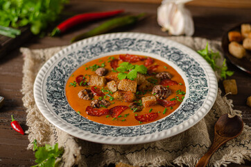 Goulash soup with beef and spicy sausage