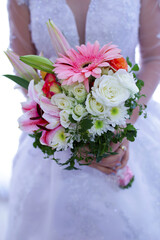 Wedding flowers, bridal bouquet closeup. Decoration made of roses, peonies and decorative plants, close-up, selective focus, objects
