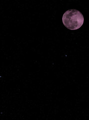 super pink moon april with starry background