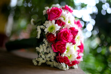 Wedding flowers, bridal bouquet closeup. Decoration made of roses, peonies and decorative plants, close-up, selective focus, nobody, objects