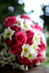 Wedding flowers, bridal bouquet closeup. Decoration made of roses, peonies and decorative plants, close-up, selective focus, nobody, objects