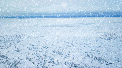 Aerial view of white winter frozen lake  from above. bird's eye, drone shot. amazing natural background