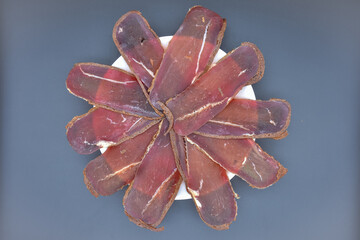 slices of basturma on a plate