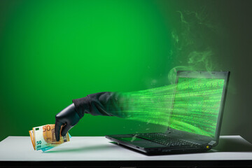 A computer hacker is stealing money from a monitor screen. A man steals euro bills