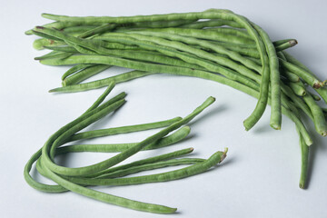 green beans on a white background. Harvesting. Home cooking
