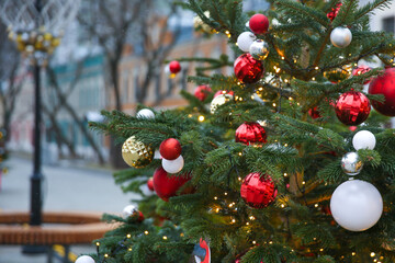 christmas background with decorated new year tree outdoor