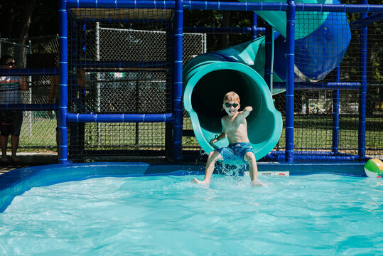 Kid coming out of waterslide