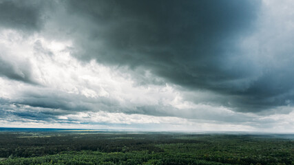 Scenic Sky With Rain Clouds Over Green Forest Landscape. Spring Summer Rainy Weather