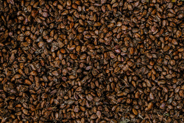 dried grape seeds. Close-up raw seeds surface as a background.