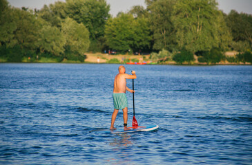 Man on a SUP board in the river