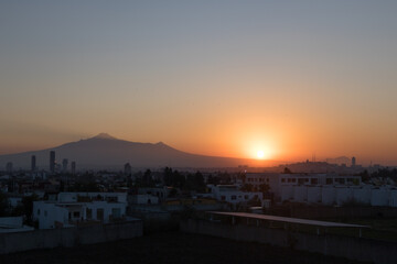Fototapeta na wymiar City of Puebla with malinche mountain at sunrise