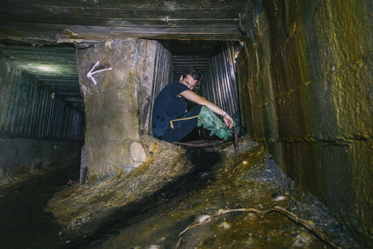  The guy in the underground tunnel inside old sewer shaft