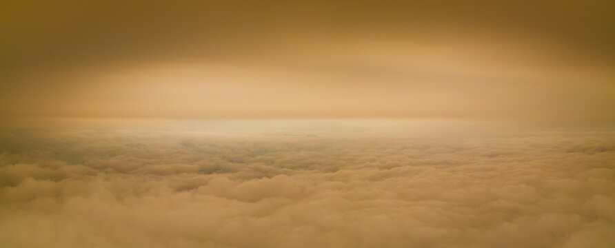 A layer of thick smoke, generated by many wildfires, darkens the sky above the marine layer over the San Francisco Bay Area. Fires have caused severe air pollution problems throughout the west coast.