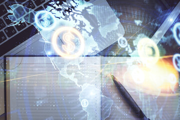 Stock market graph and top view computer on the table background. Multi exposure. Concept of financial education.