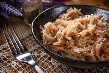 Stewed cabbage with onion and tomato.