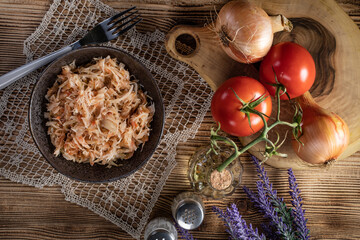 Stewed cabbage with onion and tomato.