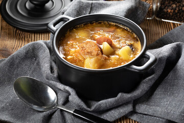 Traditional russian sour cabbage soup