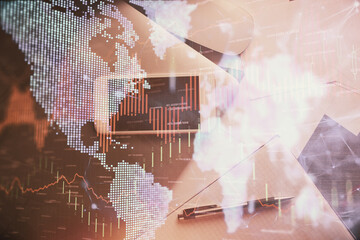 Multi exposure of forex graph hologram over desktop with phone. Top view. Mobile trade platform concept.