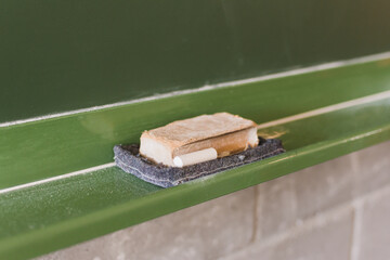 Eraser and chalk on the blackboard