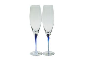 Beautiful view two slim tall and elegant champagne glasses isolated on white  background. Alcohol concept. 