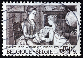 Postage stamp Belgium 1977 Mother and Daughter with Album