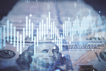 Double exposure of forex graph drawing over us dollars bill background. Concept of financial markets.