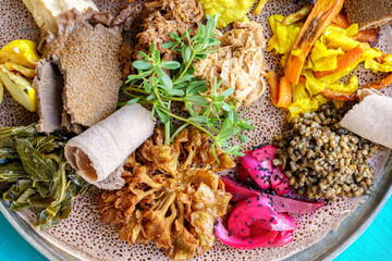 Ethiopian food served atop injera flatbread.