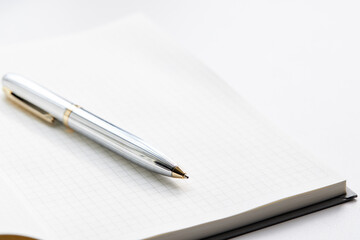 open blank diary or notebook with pan. storytelling concept. planning concept. minimal