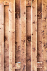 Planks of wood on the wall, background picture of vertical orientation