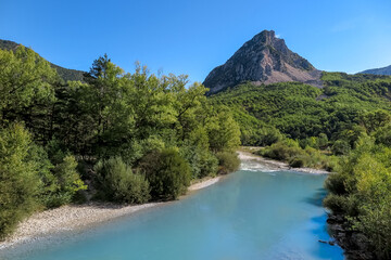 Verdon River flowing between vegetation and mountains, Verdon Gorge, Provence-Alpes-Côte d'Azur...