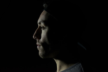 Young man in social media coat, dark concept of male depression, positive campaign, man advertising