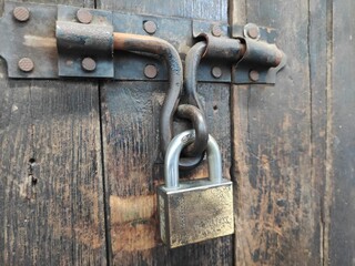 A lock is a mechanical or electronic fastening device that is released by a physical object by supplying secret information  or by a combination thereof or only being able to be opened from one side s
