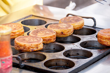 Cooking in the Chinese market, street food