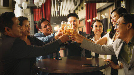 businesspeople toasting and clinking wine or champagne together