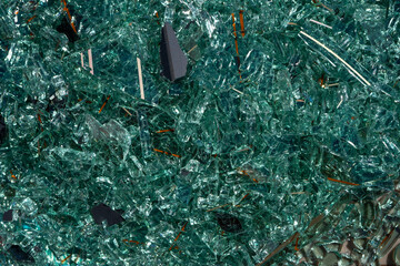 Closeup of broken car glass shards. Shiny Texture