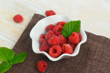 ripe and juicy raspberry berry. the concept of a summer crop, diet, vegetarian food.ecological products from the garden