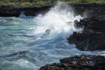 waves crashing on rocks