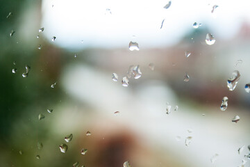 Water drops after rain on clean glass. Beautiful drops texture. Background of drops on the glass