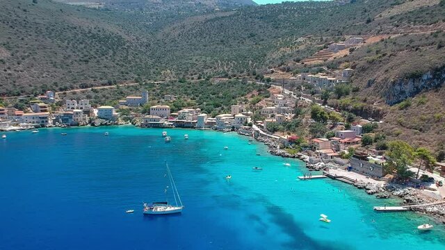 Aerial panorama view of the famous village Limeni with amazing colors and turquoise crystal water. Amazing scenery over Laconia, Peloponnese, Greece, Europe