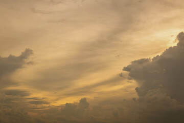 Beautiful sunset sky above clouds with dramatic light