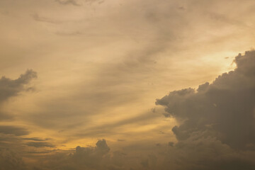 Beautiful sunset sky above clouds with dramatic light